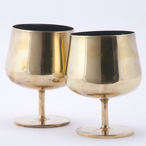 Appraisal: FLORENCE KNOLL KNOLL Pair of brass cordials with black enamel