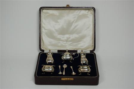 Appraisal: A modern cruet Birmingham comprising two pepperettes two open salts