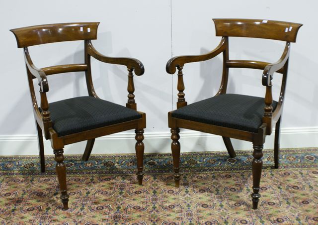 Appraisal: A pair of George III style mahogany armchairs