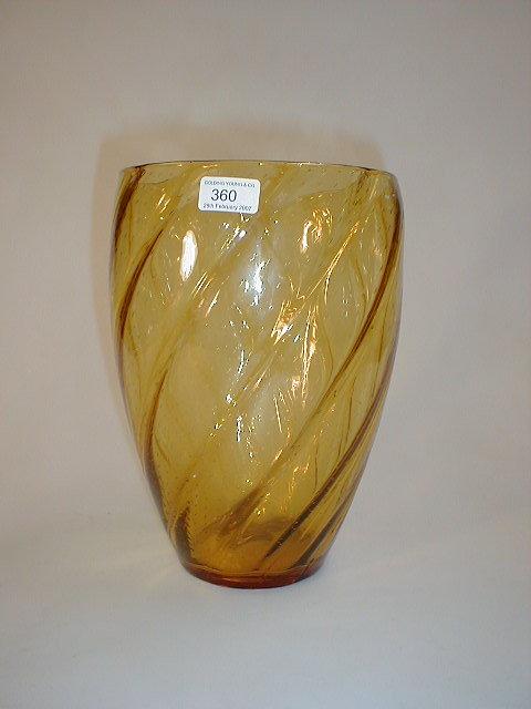 Appraisal: A large ribbed glass vase amber with bubble inclusions