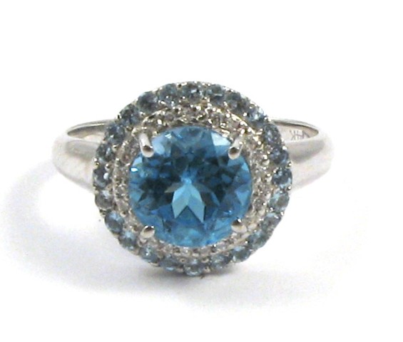 Appraisal: BLUE TOPAZ AQUAMARINE AND DIAMOND RING k white gold centering