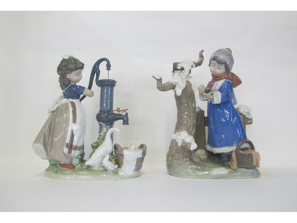 Appraisal: Lladro girl and boy Winter Frost and Summer on the