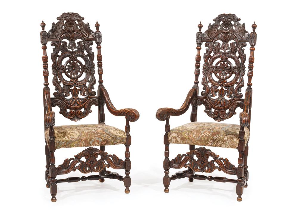 Appraisal: Pair of Flemish-Style Carved Walnut Armchairs pierced tall back acanthus