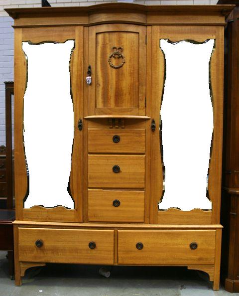 Appraisal: An Arts Crafts style fair oak wardrobe cm wide cm