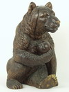 Appraisal: WOOD CARVING - German Black Forest hand carved seated bear