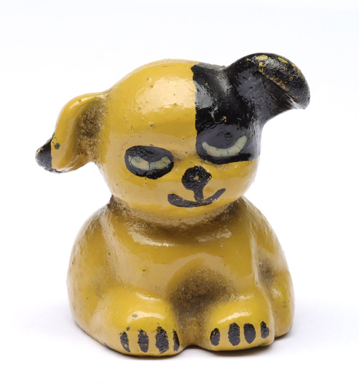 Appraisal: CAST IRON ST LOUIS PUP PAPERWEIGHTRaised lettering on the back