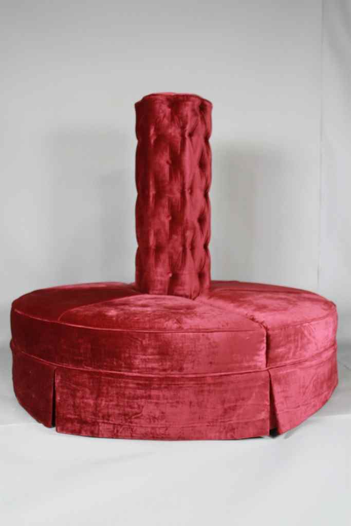 Appraisal: RED VELVET TUFTED BORNE the tufted column above a box