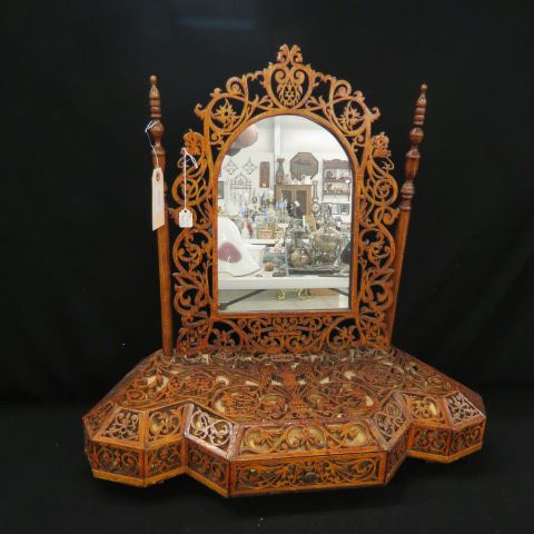 Appraisal: Victorian Carved Fretwork Dressing Mirror with drawer tilting mirror elaborate