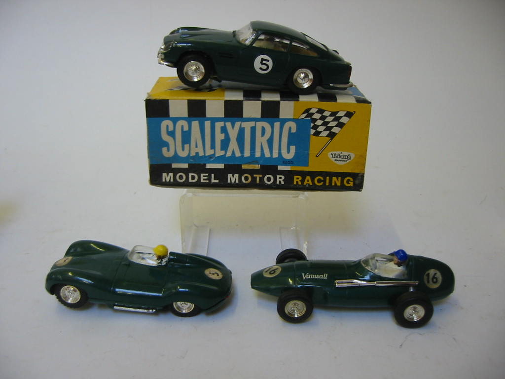 Appraisal: Three Scalextric slot racing cars C Aston Martin with lights