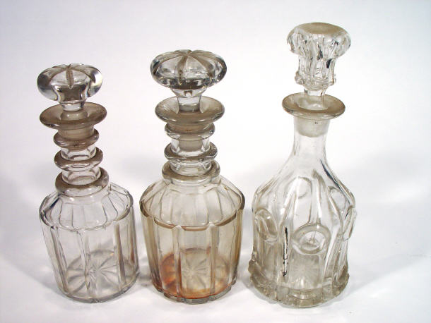 Appraisal: Pair of Victorian cut glass decanters with three annulated neck