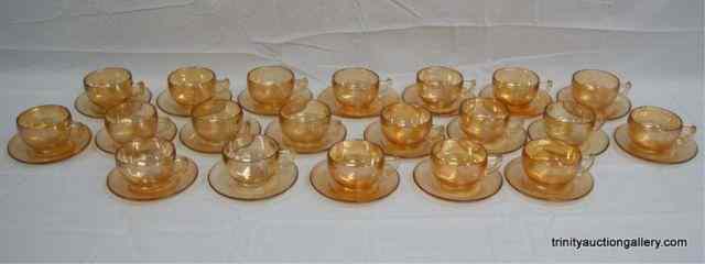 Appraisal: Set of Iridescent Carnival Glass Cups SaucersFrom the estate is