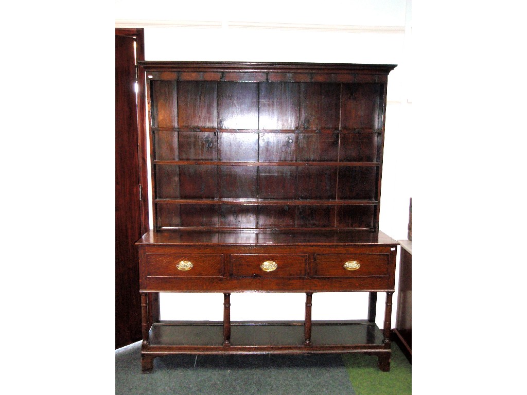 Appraisal: A George II oak dresser with plate rack having stained