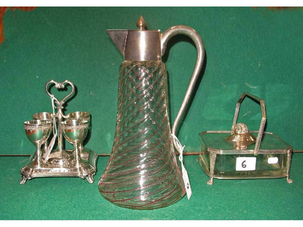 Appraisal: AN ELECTROPLATED EGG CRUET SET a swing-handled caviar dish and