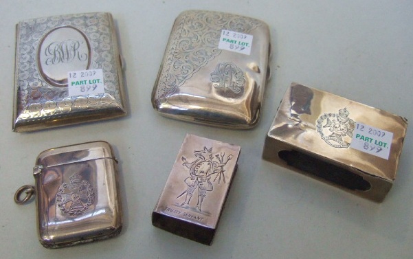 Appraisal: Silver comprising a rectangular vesta case two cigarette cases with