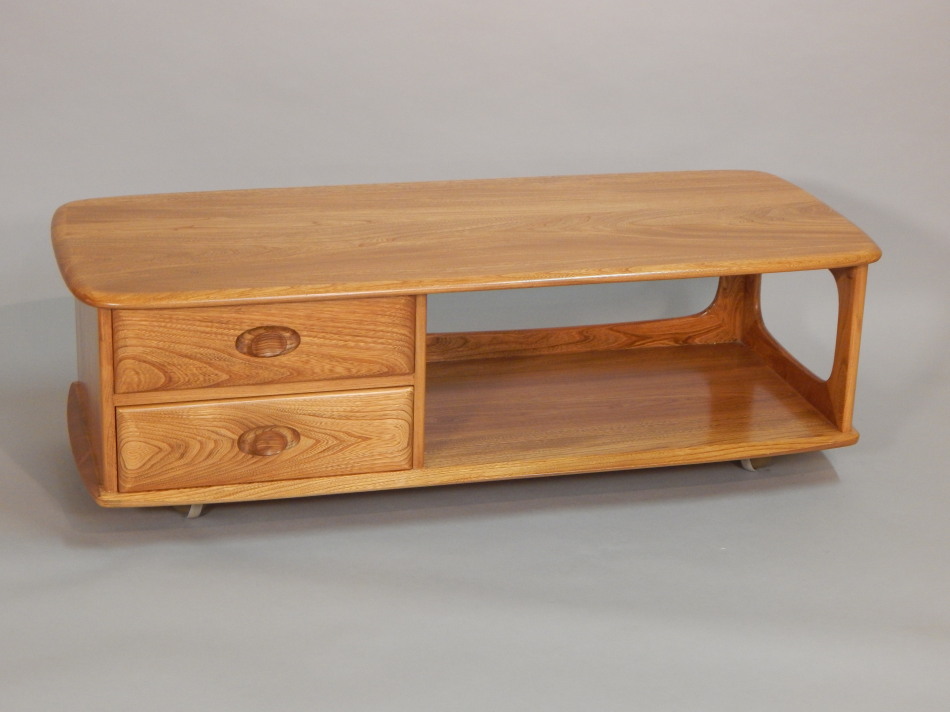 Appraisal: An Ercol light elm retro coffee table the rectangular top