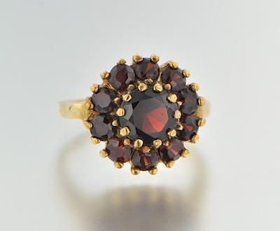 Appraisal: A Ladies' Garnet Cluster Ring k yellow gold ring set