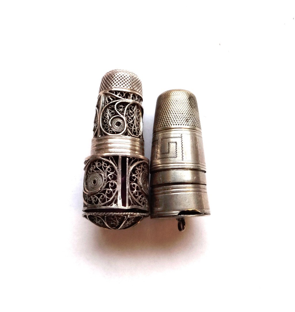 Appraisal: A th century filigree silver thimble and tape measure the