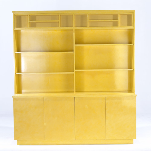 Appraisal: MID-CENTURY Custom-designed yellow enameled two-piece stereo cabinet with four shelves