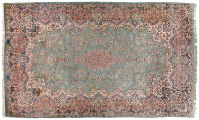 Appraisal: Kerman rug elaborate floral medallion and borders on green field