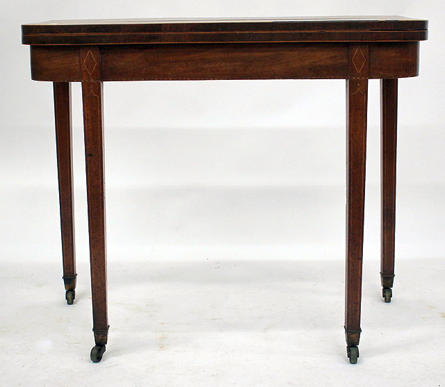 Appraisal: A TH CENTURY MAHOGANY FOLD OVER CARD TABLE with square