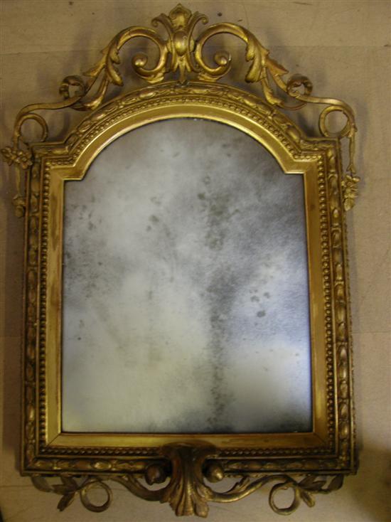 Appraisal: th century carved wood and gilt gesso wall mirror with