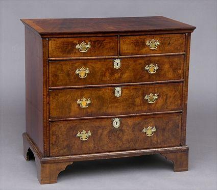 Appraisal: GEORGE I WALNUT CHEST OF DRAWERS The veneered and crossbanded