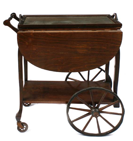 Appraisal: A Federal style mahogany tea cart height in width in