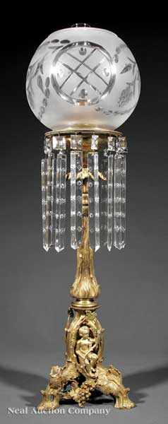 Appraisal: An American Gilt Lacquered Brass and Bronze Solar Lamp c