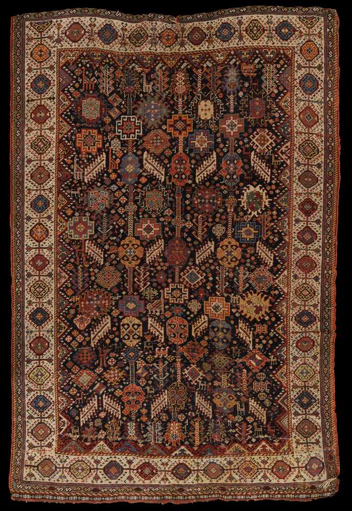 Appraisal: QASHG'AI RUG Tightly worked with stepped and latched flowerheads and