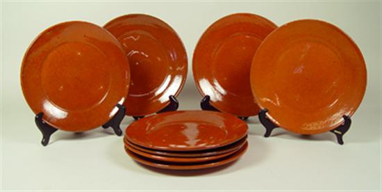 Appraisal: Ben Owen Plates Set of eight plates with orange-brown glaze