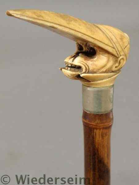 Appraisal: Bamboo walking stick th c with a finely carved ivory