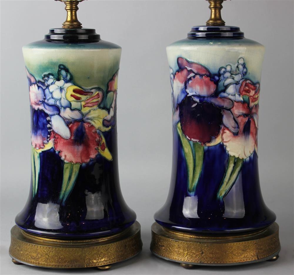 Appraisal: PAIR OF MOORCROFT 'FRILLED AND SLIPPER ORCHID' LAMPS of waisted