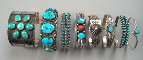 Appraisal: Eight silver and turquoise cuffs with engraved designs one marked