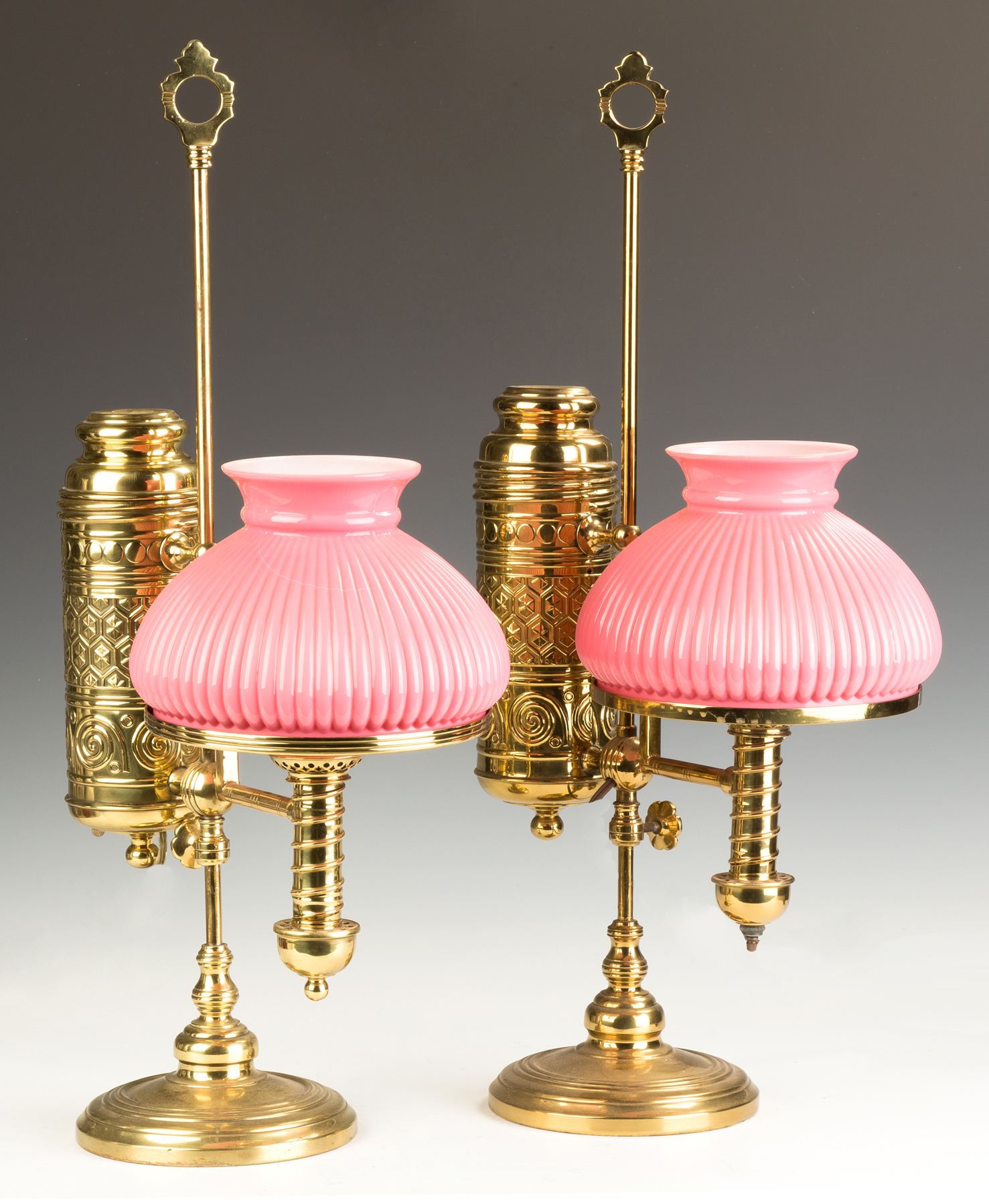 Appraisal: Pair of Manhattan Student Lamps th century With pink cased