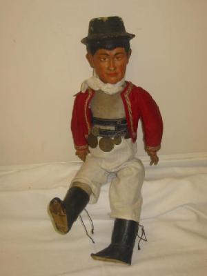 Appraisal: A composition gentleman doll with moulded and painted face and