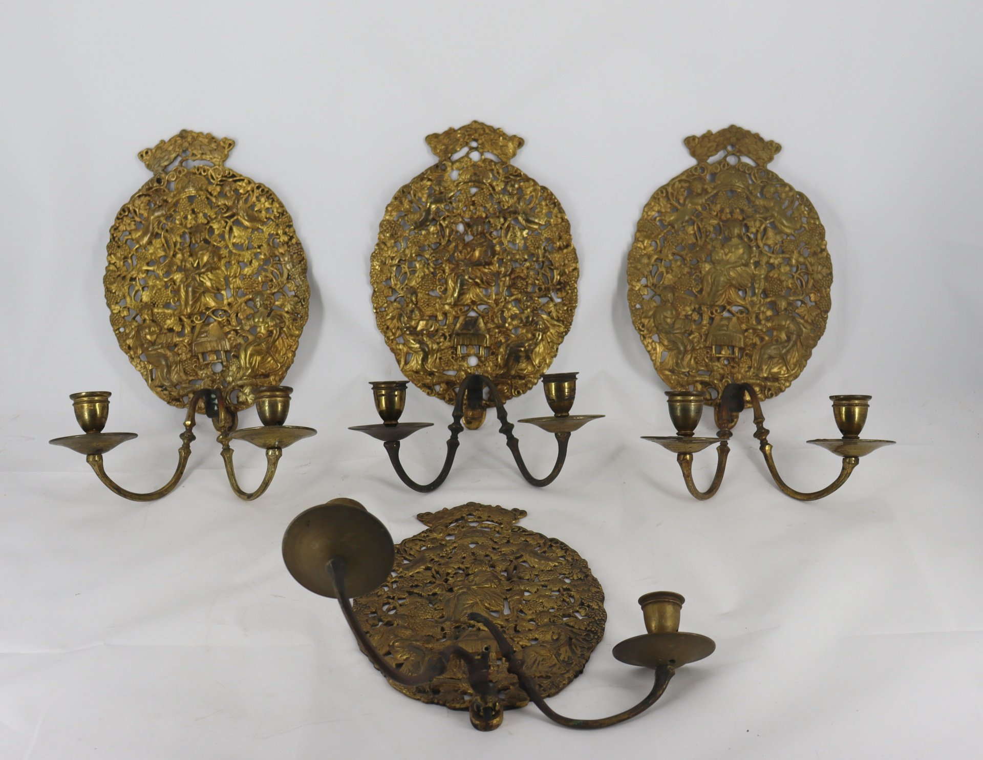 Appraisal: Antique Ornate Gilt Bronze Sconces Reticulated and carved all over