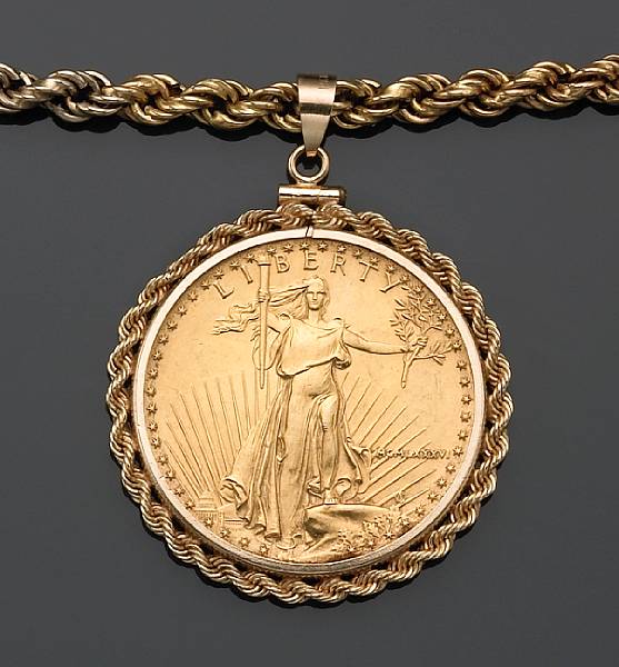 Appraisal: A Saint Gaudens gold coin and fourteen karat gold pendant