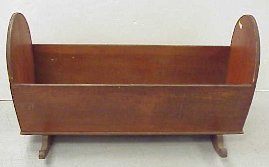 Appraisal: th th C pine cradle high arched ends red stained