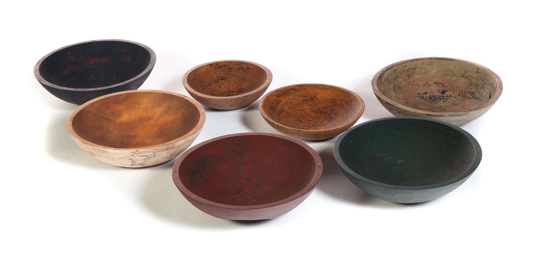 Appraisal: SEVEN PRIMITIVE PAINTED CONTEMPORARY WOODEN BOWLS American late th century