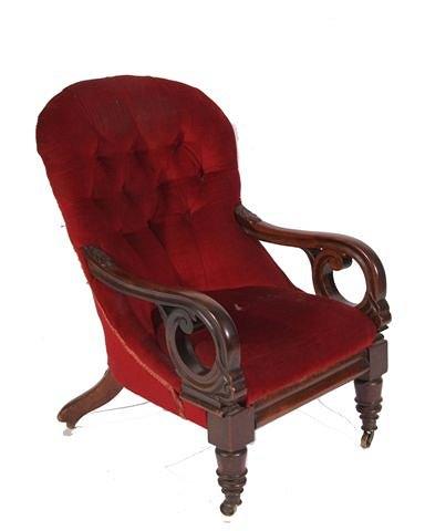 Appraisal: A William IV mahogany open arm chair with button upholstered