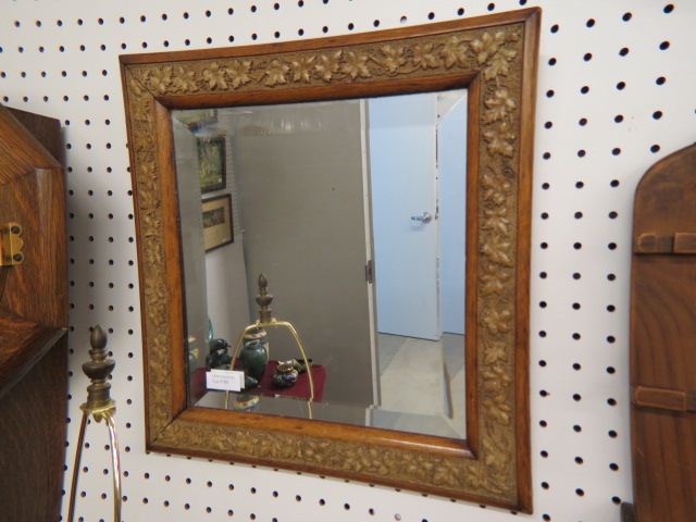 Appraisal: Antique Mirror ornate frame with vine decor beveled glass square