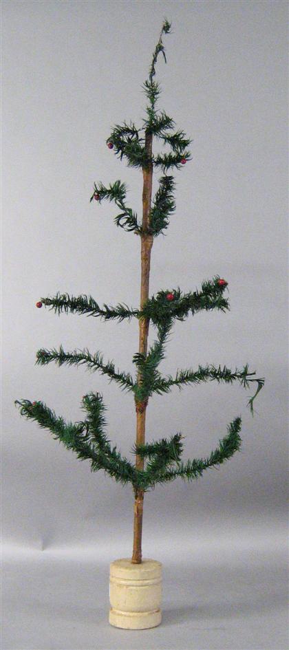 Appraisal: German feather tree late th century Comprised of green stained