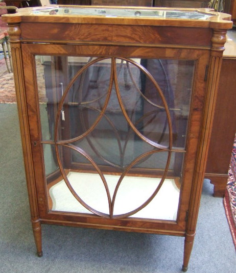 Appraisal: A th century satinwood free standing display cabinet each long