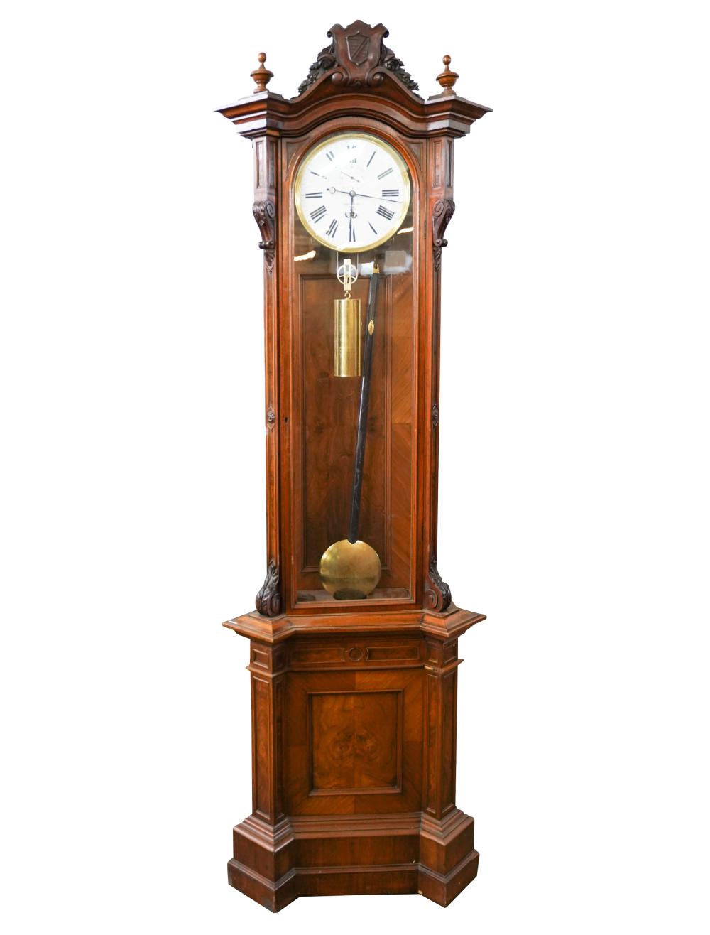 Appraisal: MARENZELLER WALNUT CARVED TALLCASE CLOCKcrica signed to enamel dial with