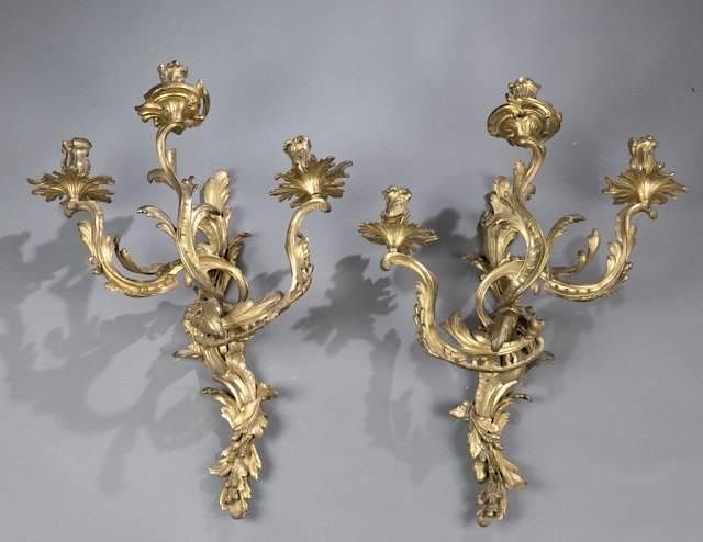 Appraisal: Pair of Louis XV style bronze light wall sconces A