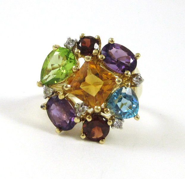 Appraisal: MULTI COLORED GEMSTONE AND DIAMOND RING k yellow gold with