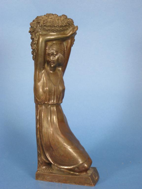 Appraisal: Le Faguays A bronze female Figure kneeling and holding a