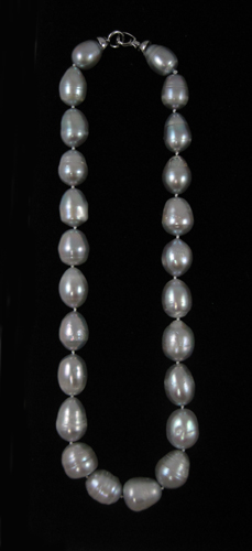 Appraisal: PRINCESS LENGTH GREY PEARL NECKLACE measuring inches in length and