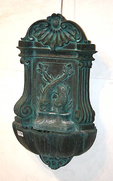 Appraisal: A Neoclassical style patinated composition wall fountain modern The scroll