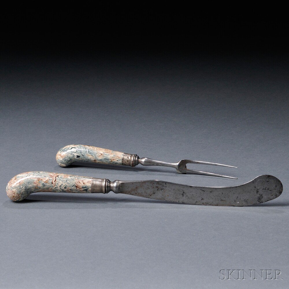 Appraisal: Two Staffordshire Solid Agate Utensils England c the pistol handles